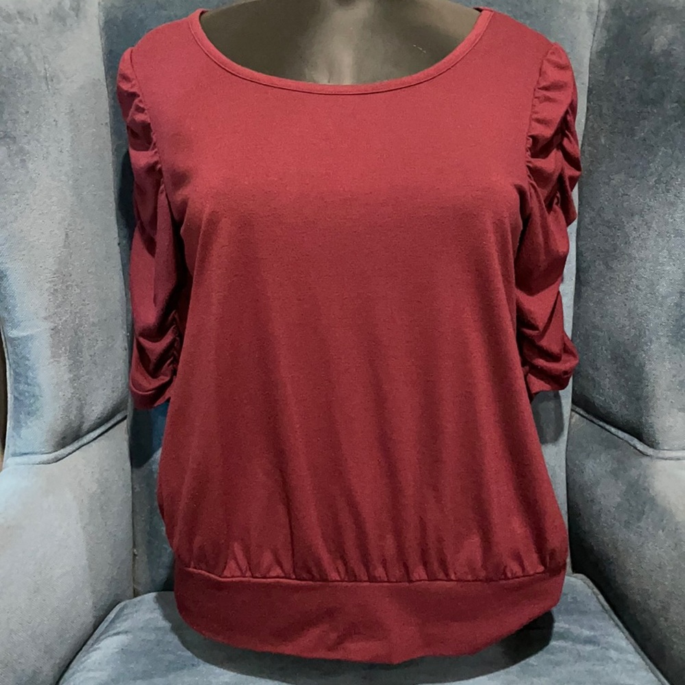 Maroon Elle elbow length shirt with ruffled sleeves. Size Medium